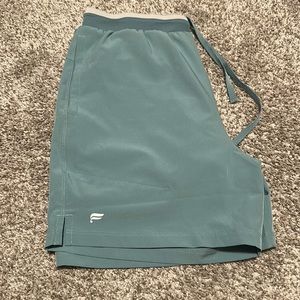 Men’s medium fundamental II, teal, 5 inch inseam, lined shorts